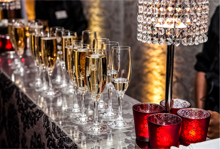 a photo of champagne flutes filled for new years