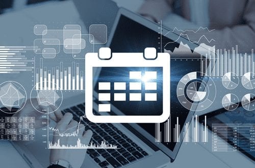 a scheduling icon over a dark background with a laptop and analysis graphs