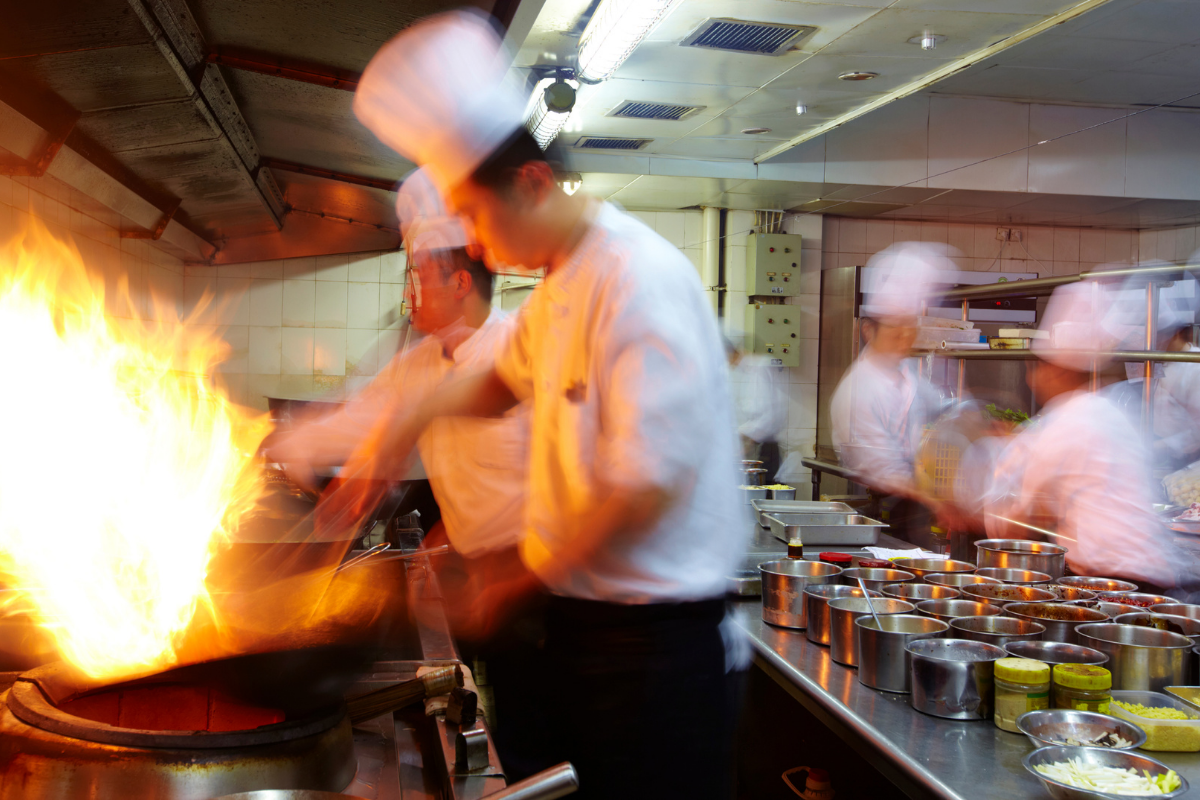 a photo of chefs working in a kitchen in an industry where poka-yoke examples are common