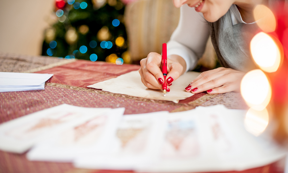 Filling out holiday cards.